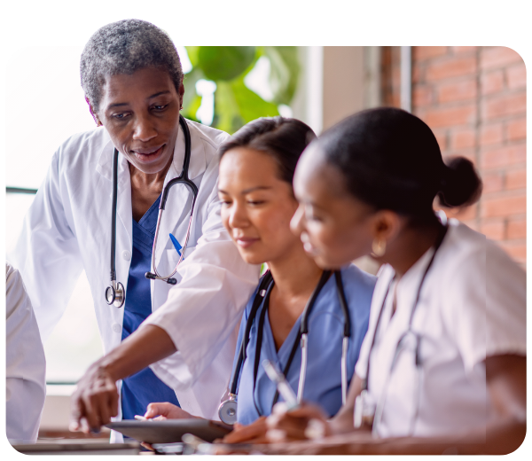 group of doctors looking over documents