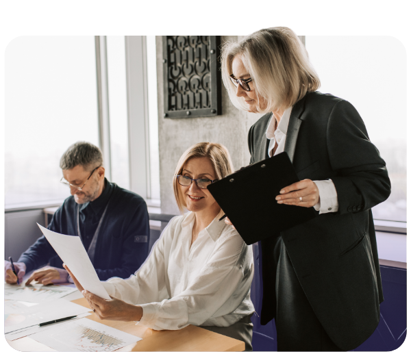 small group of people working in a conference room