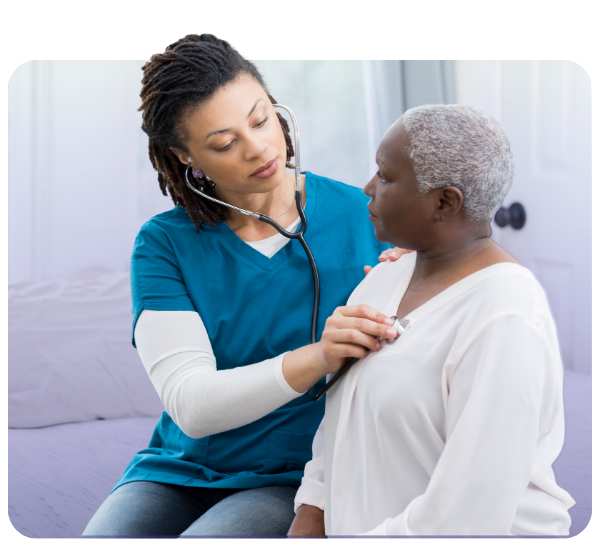 female doctor giving exam to patient