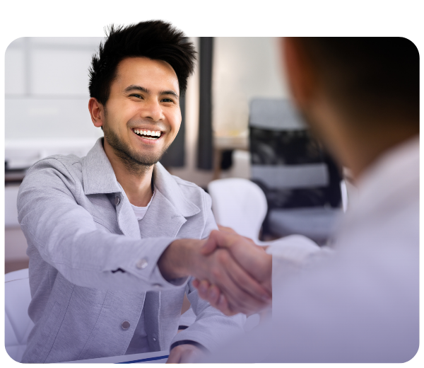 A man shaking hands with another person