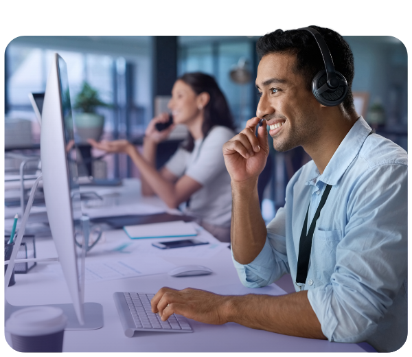 help desk employee smiling with taking a call